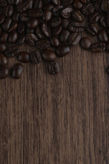 Roasted coffee bean on wooden table..