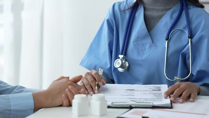 Asian female doctor or medical specialist examining a patient Ask for symptoms, give advice, recommend medication, plan treatment guidelines and preventive care. Concept of health checkup Prevention.