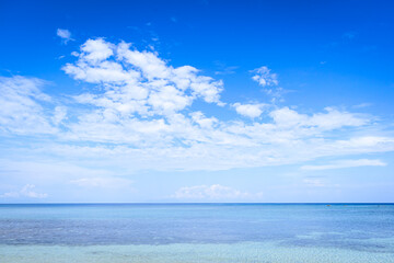 Obraz premium Tropical white sand beach in a blue sky sunny day. Aglicay, Romblon, Philippines