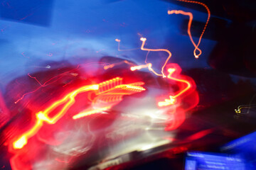 abstract light of car on road with accident in the night, blurred background