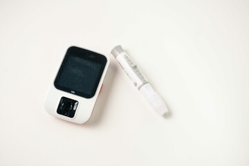 Glucometer isolate on white background. Blood glucose meter. Diabetes.