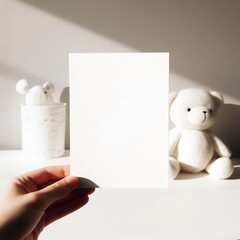 Obraz premium teddy bear with blank paper