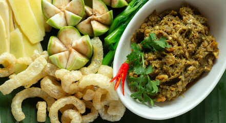 Nam Prik Num (Northern Thai Green Chilli Dip) on table
