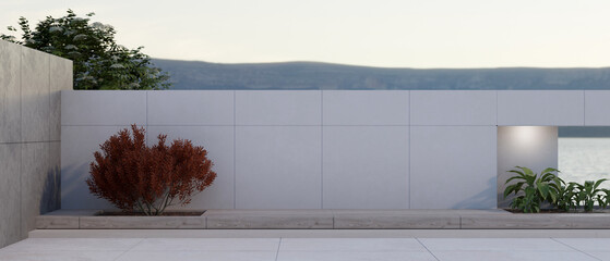 Exterior design of a modern building rooftop with an outdoor garden and cement wall.