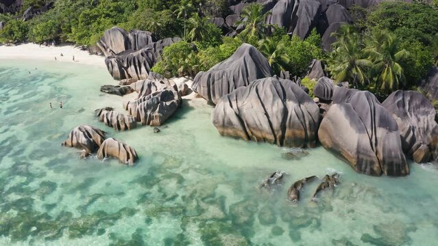 Aerial view of Anse Source d'Argent beach on a sunny day, La Digue island, Seychelles