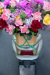 Bouquet of roses being delivered on a motor scooter. Perfect for valentine's day with clear...