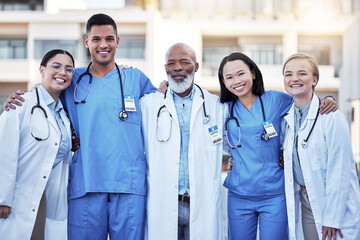 Portrait, healthcare and doctors with nurses in medicine standing outside a hospital as a team you...