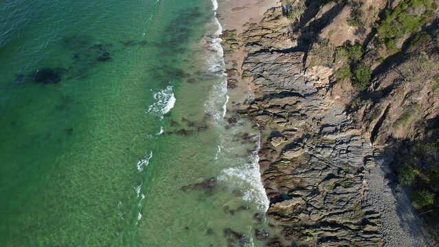 Ocean And Shore At Little Wategos Beach In New South Wales, Australia - aerial drone shot