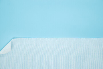 texture of comfortable elastic bandage on blue background - obrazy, fototapety, plakaty