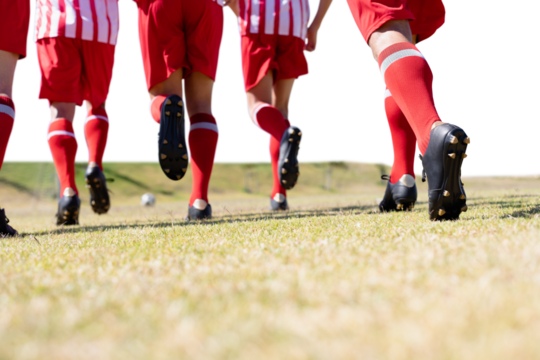 Digital png photo of diverse male football players running on transparent background