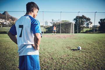Soccer, thinking and a man on a field for a goal, sports penalty or training for a team. Fitness,...