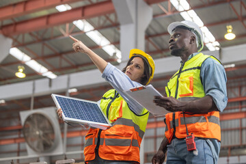 Factory metal workers install solar panels, cut costs, earn carbon credits, combat climate change.