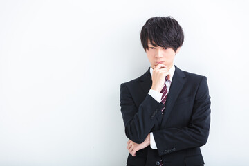 考え込むビジネスマン　Business