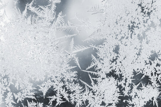 Beautiful pattern of a frost on a window glass, macro photo