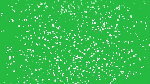 Snowfall overlay on green background. Winter slowly falling snow effect. 4k video animated