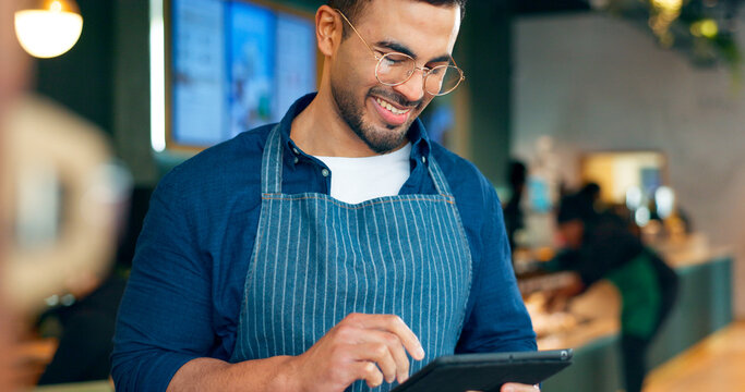 Cafe, happy man and barista on tablet of restaurant sales, online management or customer service reviews. Entrepreneur, waiter or small business owner reading digital technology for coffee shop data