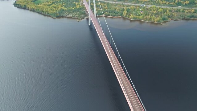Aerial View Of High Coast Bridge Over &Aring;ngerman&auml;lven River With Autumn Forest Near Veda, Sweden.