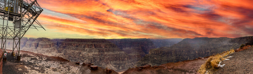 Fototapeta na wymiar Panoramic of the guano mine at the west viewpoint of the Grand Canyon National Park of Colorado, under a reddish sky at sunset, in the state of Arizona in the United States of America.