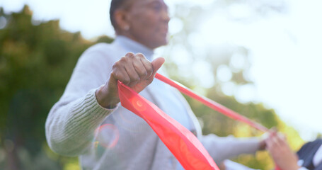 Woman, hand and resistance band for physiotherapy with exercise in garden, backyard or outdoors....