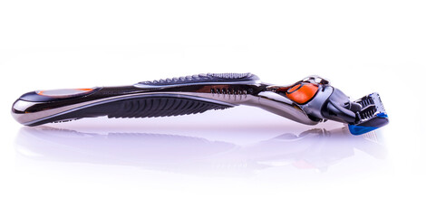 Obraz premium New colored Sensor shaving razor isolated on a white background