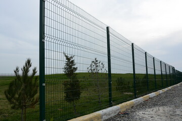 Obraz premium High green metal fence, High Security Palisade Metal Fencing Manufacturer