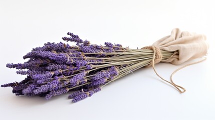A tied bundle of dried lavender stems, their purple flowers contrasting against the pure white...