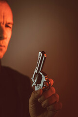 Gunman killer holding pistol artistic photo