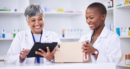 Happy woman, pharmacist and team with tablet and box in logistics for inventory inspection or stock at pharmacy. Women smile with technology, medical or healthcare supplies and pharmaceuticals - obrazy, fototapety, plakaty