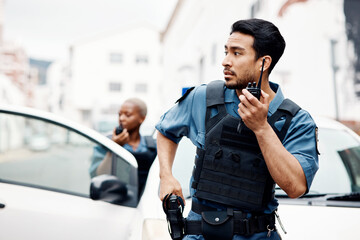 Police, emergency and officer with gun calling backup for an investigation or law protection in...