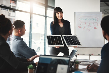 Woman, solar panel and business presentation in office with investor group, ideas or future of...