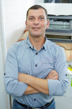 portrait of man in workplace in building store