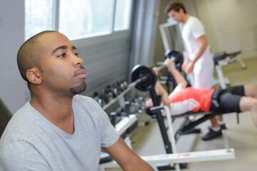 Fototapeta premium man resting from gym exercises