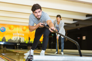 Fototapeta na wymiar staff cleaning and preparing bowling alley