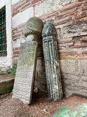 Ottoman Tombstone columns at old cemetery in Fatih district of Istanbul, Turkey. 