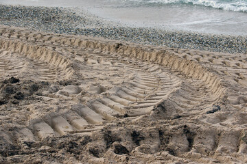 Trace de nettoyage sur le sable