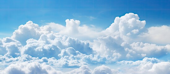 Vibrant blue sky with fluffy clouds - obrazy, fototapety, plakaty