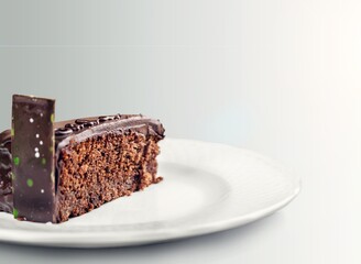 A piece of chocolate tasty sweet cake with cream