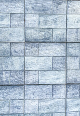 Sideway concrete stones with checkered pattern.