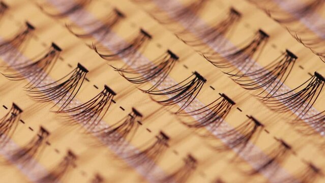 Modern set of false eyelashes for gluing. Women's cosmetics, close-up, macro. Slider