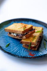 Grilled Cheese Sandwiches on Blue Plate