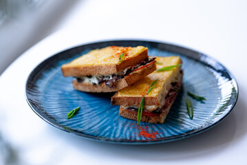Grilled Cheese Sandwiches on Blue Plate