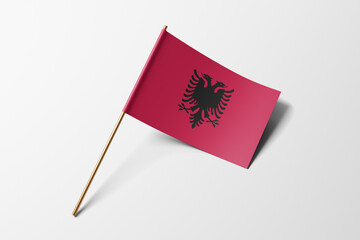 Albania flag of small paper, isolated on white background