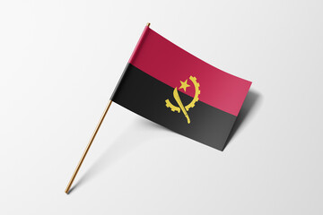 Angola flag of small paper, isolated on white background