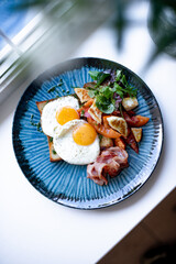 Breakfast Plate with Fried Eggs and Bacon