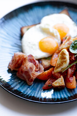 Breakfast Plate with Fried Eggs and Bacon