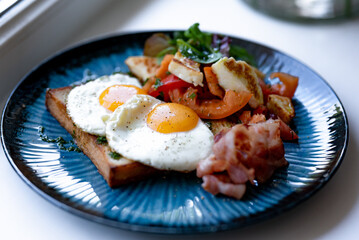 Breakfast Plate with Fried Eggs and Bacon