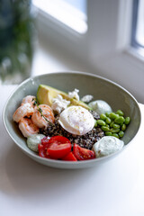 Grain Bowl with Avocado, Shrimp, Tomato, Mozzarella, and Legumes