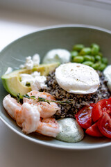 Grain Bowl with Avocado, Shrimp, Tomato, Mozzarella, and Legumes