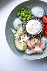 Grain Bowl with Avocado, Shrimp, Tomato, Mozzarella, and Legumes
