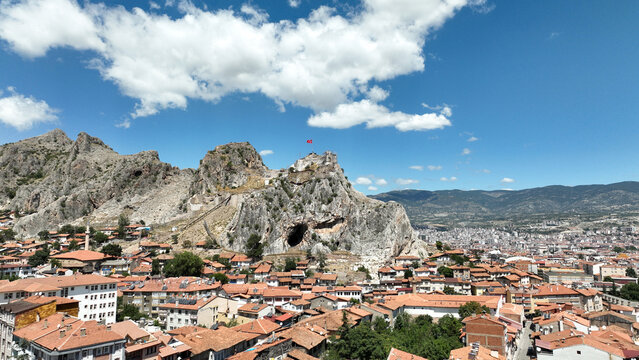 A photo of Tokat city center and Tokat Citadel by drone. Buildings located around the citadel.